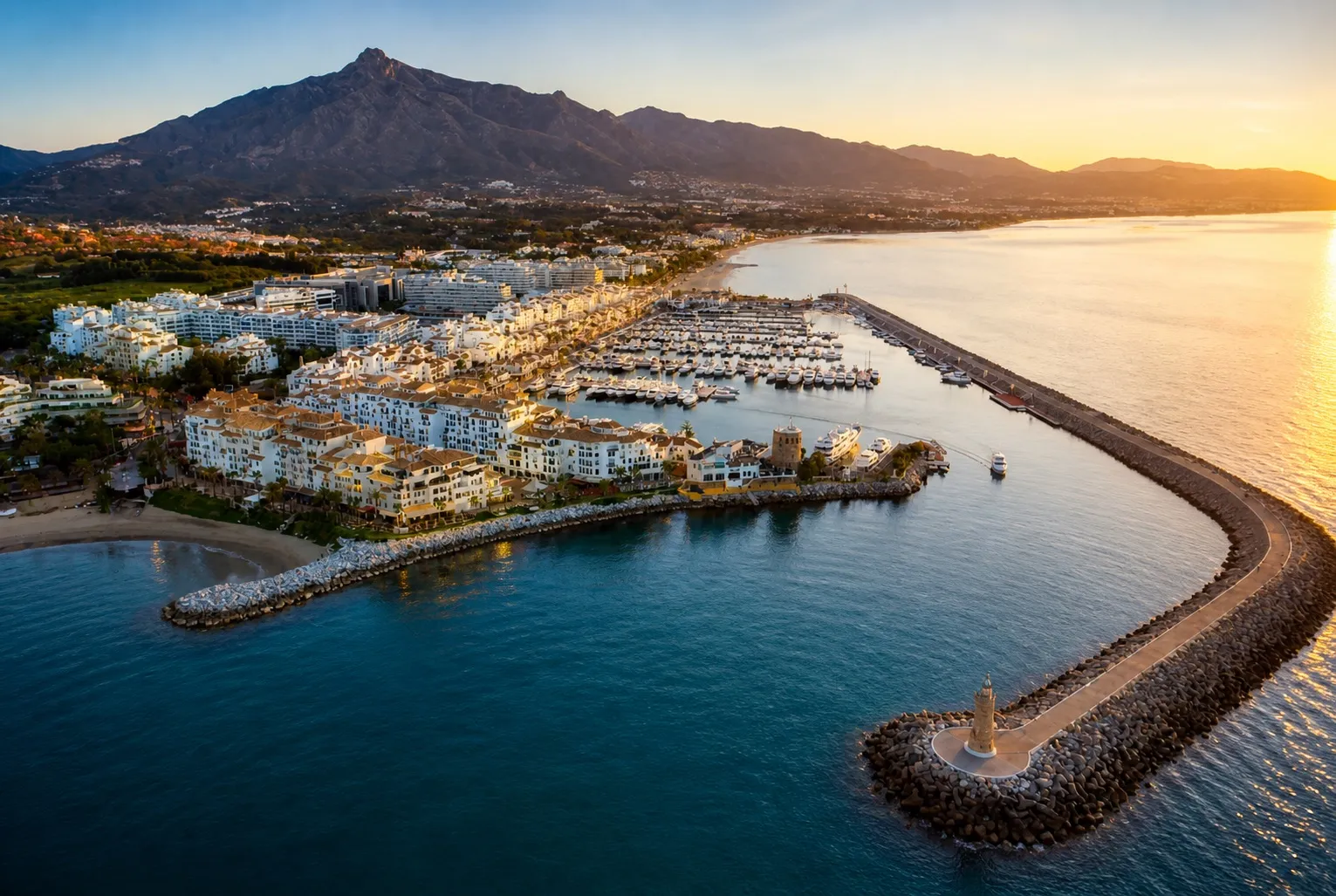 Marbella harbor at sunset
